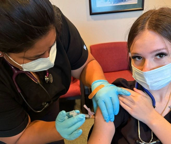 students training to administor blood draws